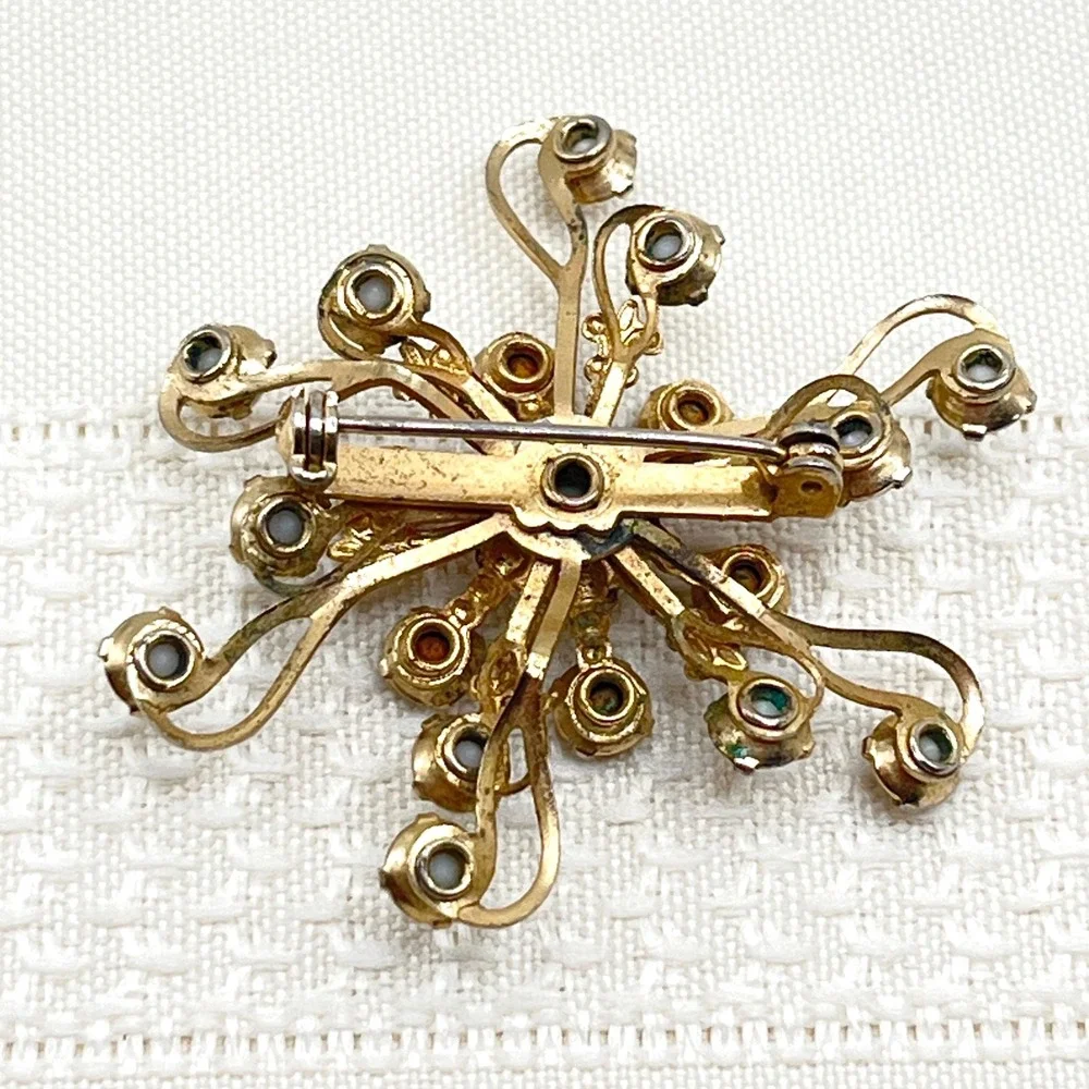 Vintage Milk Glass & Crystal Rhinestone Gold Tone Pinwheel Snowflake Brooch
